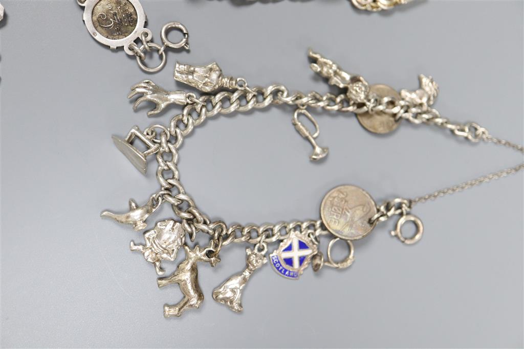 A stylish 925 brooch, silver monument bracelet, charm bracelet etc.